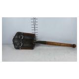 Folding trench shovel with leather cover