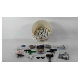 Golfing group, golf wrenches, cleats, and balls,
