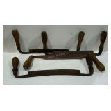 Four drawing knives. All have surface rust but