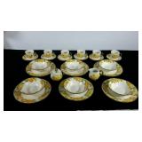 Metlox dishes in Poppy Trail, Sculptured Zinnia.