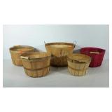 Group of five apple baskets, one with water