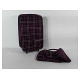 Purple plaid suitcase on wheels and matching