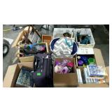 Skid lot: purses, VHS tapes, decor boxes, water