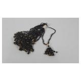 Costume jewelry,  one dozen black beaded