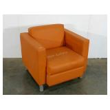 Vinyl arm chair, orange, needs cleaned