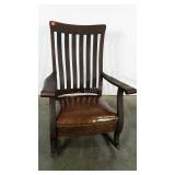 Large framed rocking chair with leather seat and