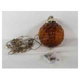 Mid-century style swag lamp, with orange glass