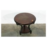 Accent table, warped on top as shown