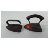 Two cast sad irons, one marked No. 8