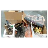 Skid lot: boots, luggage, flex hose with quick