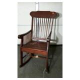 Older rocking chair, solidly built, but in need