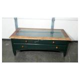 Glass top display, coffee table with drawers.