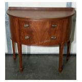 Round front , two drawer stand. Shows wear but