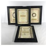 Four shadowbox wall hangings, each representing a