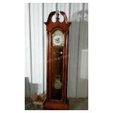 Howard Miller grandfather clock. Side glass is