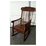 Older rocking chair, solidly built.