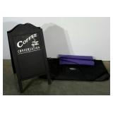 Advertising sandwich board, yoga mat and carry