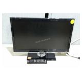 Samsung 22" television on stand with remote.