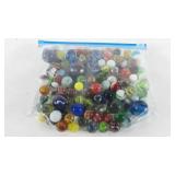 Ziploc bag of marbles, includes some shooter