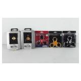 Toys, five spinners, includes two NFL 3 way