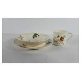 Porcelain plate, bowl, and cup with circus design