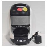 The Sharper Image speaker, powers up