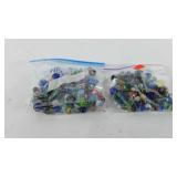 Two ziploc bags of marbles, includes some shooter