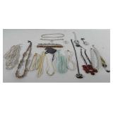 Jewelry, includes necklaces, bracelets, and a pin