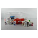 Art supplies, storage basket full of mod podge,