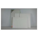 Four stretched artist canvases, 15 x 30 in