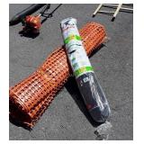 Roll of Bird Netting, and partial roll of orange