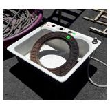 Cast enamel kitchen sink with fracture damage and