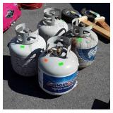 4 Propane Tanks may be a little in each but