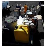Skid of Chemicals, paints, stains, etc. Covered