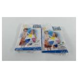 Two inflatable beach balls, unopened