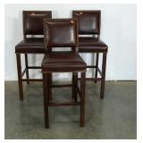 Three leather-look bar stools, nice condition,