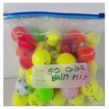 Golf balls, Fifty colored golf balls, all used,