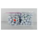 Golf balls, includes 50 Taylor made balls and 50