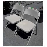Two Metal Folding Chairs