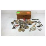 Small jewelry box with jewelry and a skeleton key