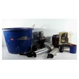 Blue storage tub full of vehicle hardware,