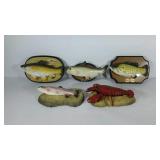 Five singing fish wall plaques