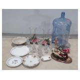 Glass candle holders, plates, water jug, woman