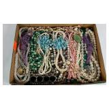 Group of costume jewelry, necklaces, bracelets,
