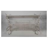 Three painted metal wall-mounted shelves, folding