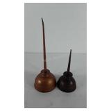 Two oil cans, one marked eagle