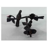Cast iron bird and floral decor