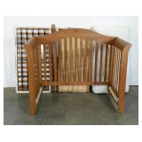 Crib with storage drawer and mattress. There is a
