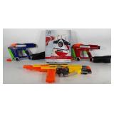 Three Nerf guns and shooting gallery with