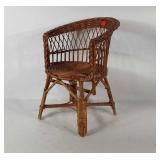 Wicker child sized chair, 13.5" × 19" × 14"
